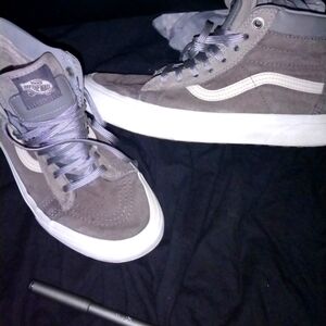 Fleece lined high top Vans in dark gray men's size 6